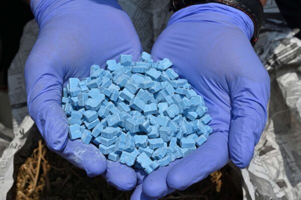 MDMA (Ecstasy) tablets and powder - Synthetic drug known for euphoria and sensory enhancement