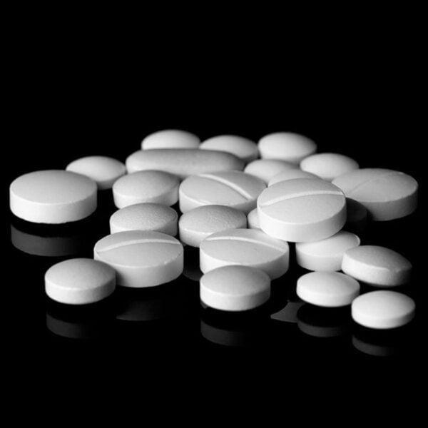 Oxycodone tablets and packaging - Potent medication for managing severe pain.